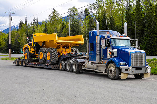 Heavy haul truck with massive machinery equipment