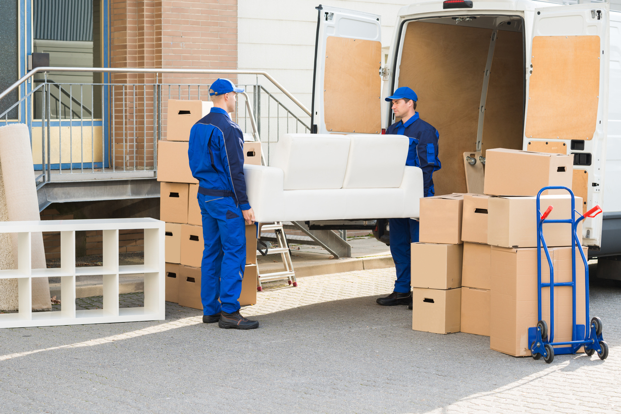 Two people carrying out detailed high-touch white glove delivery assembly